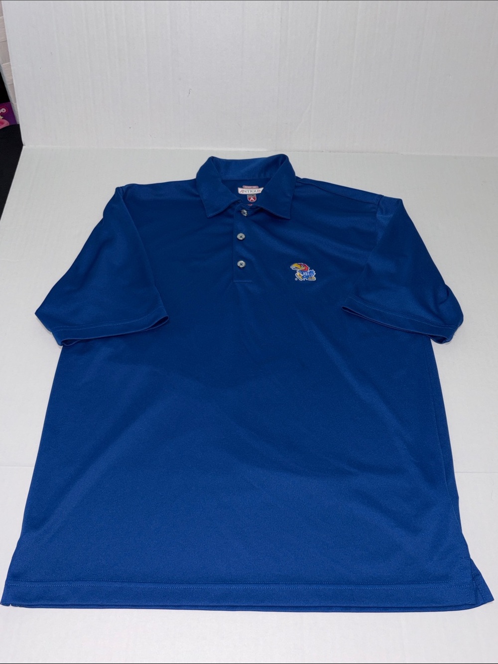 Antigua Men’s Blue Desert Dry Small Kansas Jayhawks Golf Polo